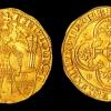 Dobra pé-terra, gold coin with image of King Fernando standing up.